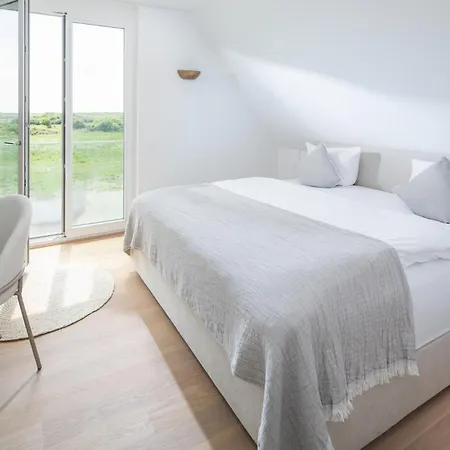 Strandhaus Suedwesthoern بيت للعطل نورديرني